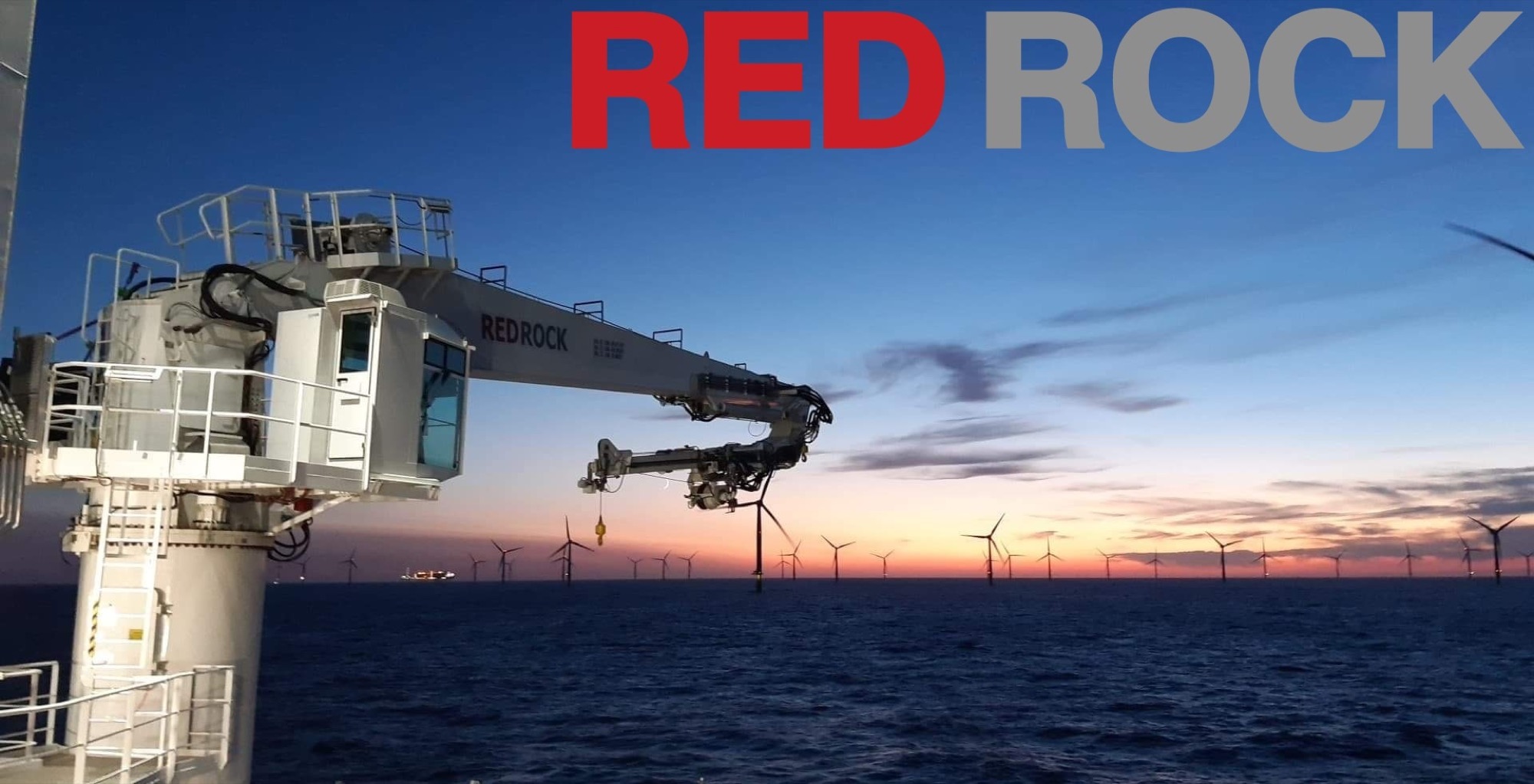 Red Rock 3D motion-compensated crane offshore at sunset